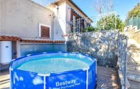 Stunning home in Loiri Porto San Paolo with 1 Bedrooms